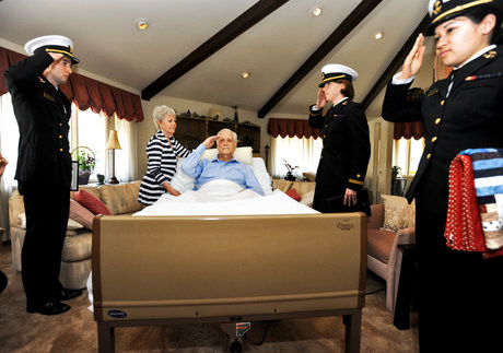 USNA Midshipmen volunteer to administer “Honor Salute” to dying Veterans.  Richard is the dying Vet, wife and several family members