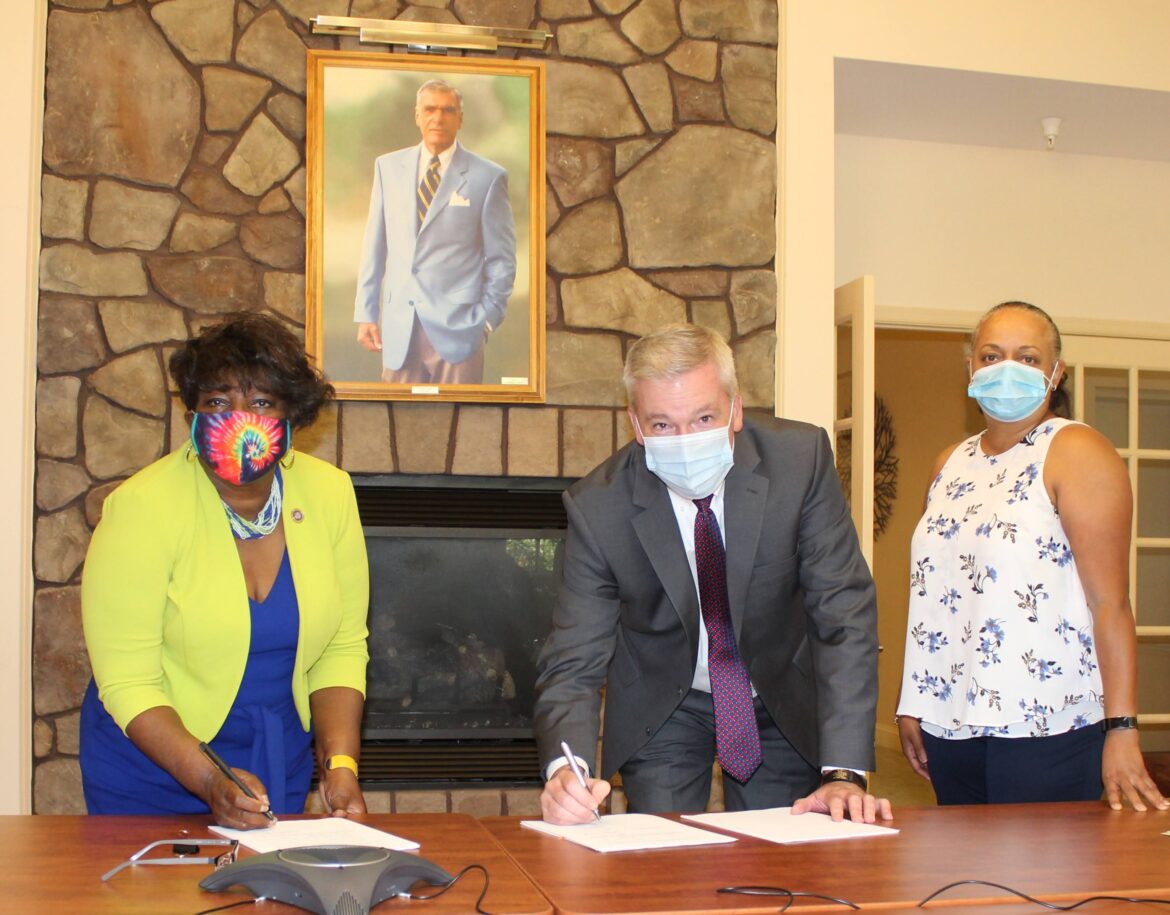 Signing the papers that make Hospice of the Chesapeake's acquisition of Hospice of Charles County final are, from left, Delegate Edith Patterson, Hospice of Charles County Board of Directors Vice Chair; Mike Brady, Acting CEO, Hospice of the Chesapeake; and Regina Moody, Chief Operating Officer, Hospice of the Chesapeake.