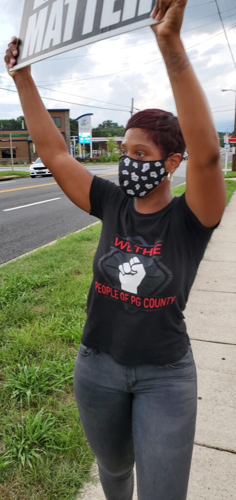 Nurse Practitioner Rachel Sherman protesting against racism at Fish Market restaurant in Clinton, MD