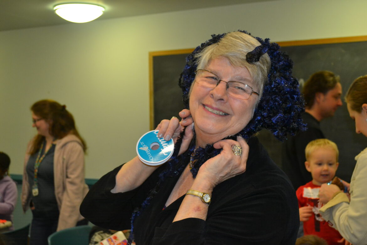 Carol Fritz has some fun while she volunteers at a Chesapeake Life Center event 