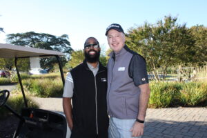 Jerray Slocum of Severn Bank and Hospice of the Chesapeake President and CEO Mike Brady pose before the start of the Golf Tournament