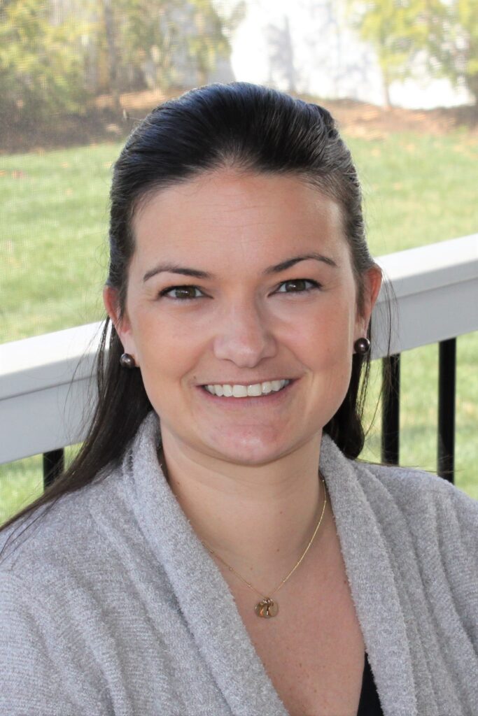 Headshot of Ashley Kinnally, author of Living with ALS and how supportive care can help people take control