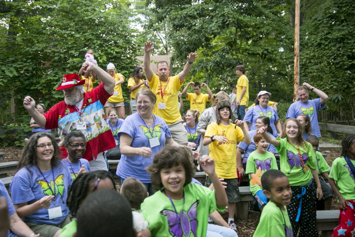 Campers and counselors get silly during a grief camp activity at Camp Nabi.