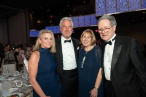 From left, Martha and Brian Gibbons, Chairman and CEO of Greenberg Gibbons with Cathy and John Belcher.