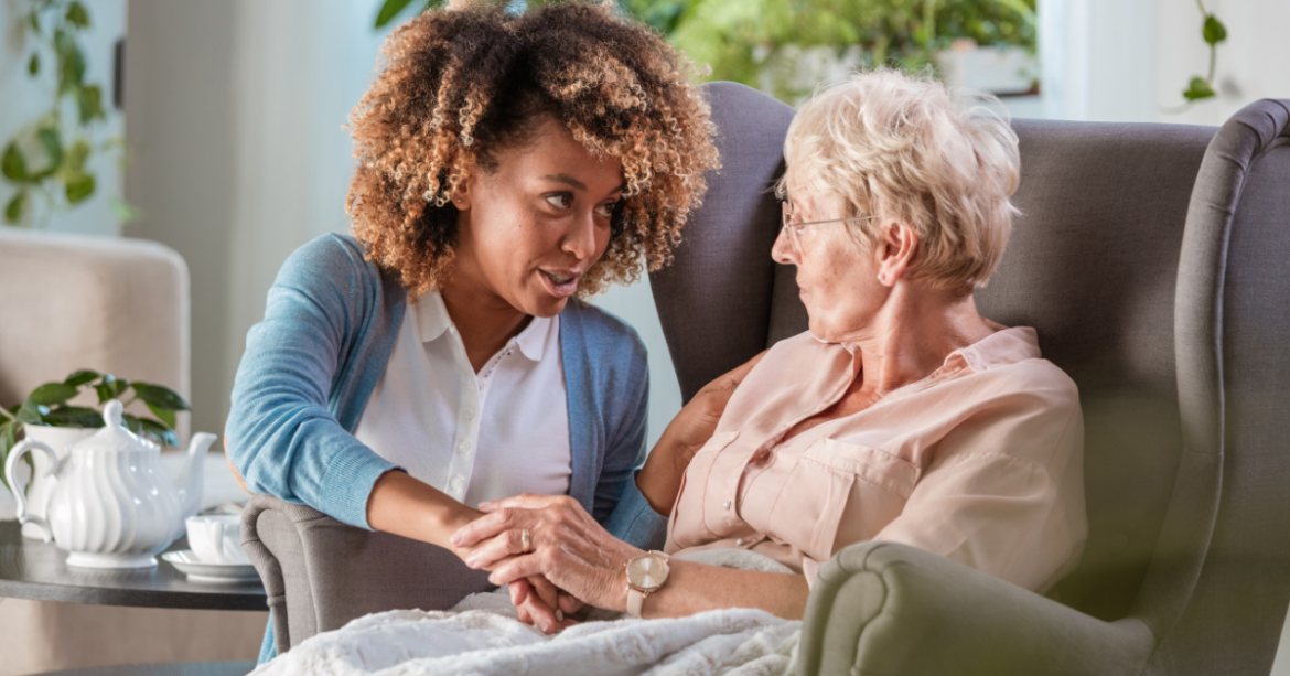 A hospice social worker talks with a patient. Listening. Talking. Just being in the moment. 