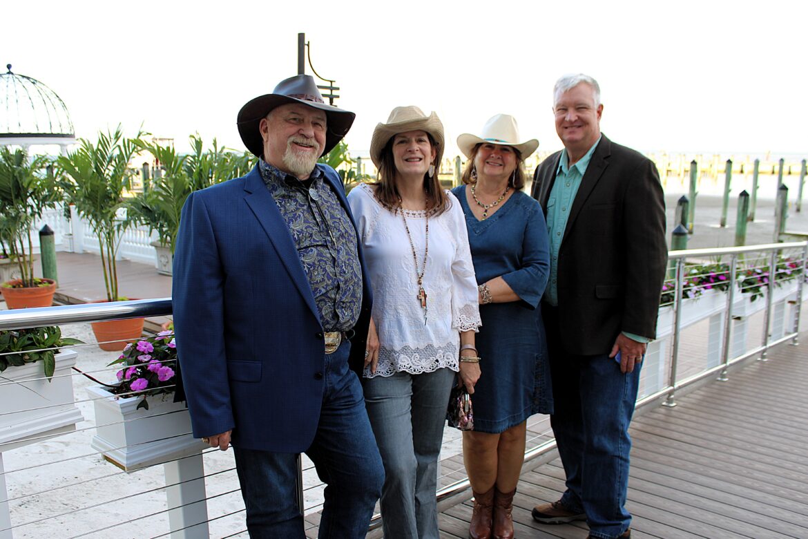 From left, Doug Ballard; Deb Ballard; Laura McDaniel; and Richard Wilder, Vice Chair, Hospice of the Chesapeake Board of Directors at Boots & Bling.