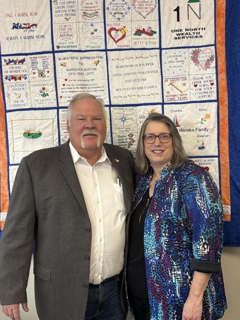 Brian Hahn, Partners In Care of Maryland, Inc., Chair of the Board of Directors and Becky Miller, Hospice of the Chesapeake President and CEO, pose for a photograph at the Partners In Care, Maryland, Inc., offices in Pasadena, Maryland. 