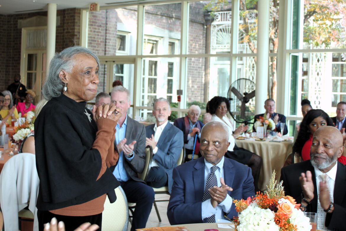 Cherrie Britton stands to be recognized after Joyce Phillip shared how Hospice of the Chesapeake cared for her husband at the Sip & Savor: A Taste of Prince George's event 